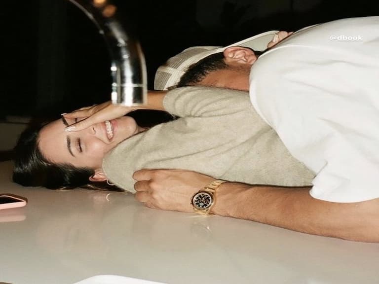 Kendall Jenner 首度將 NBA 球星 Devin Booker 戀情官方化,情人節「埋胸」放閃!
