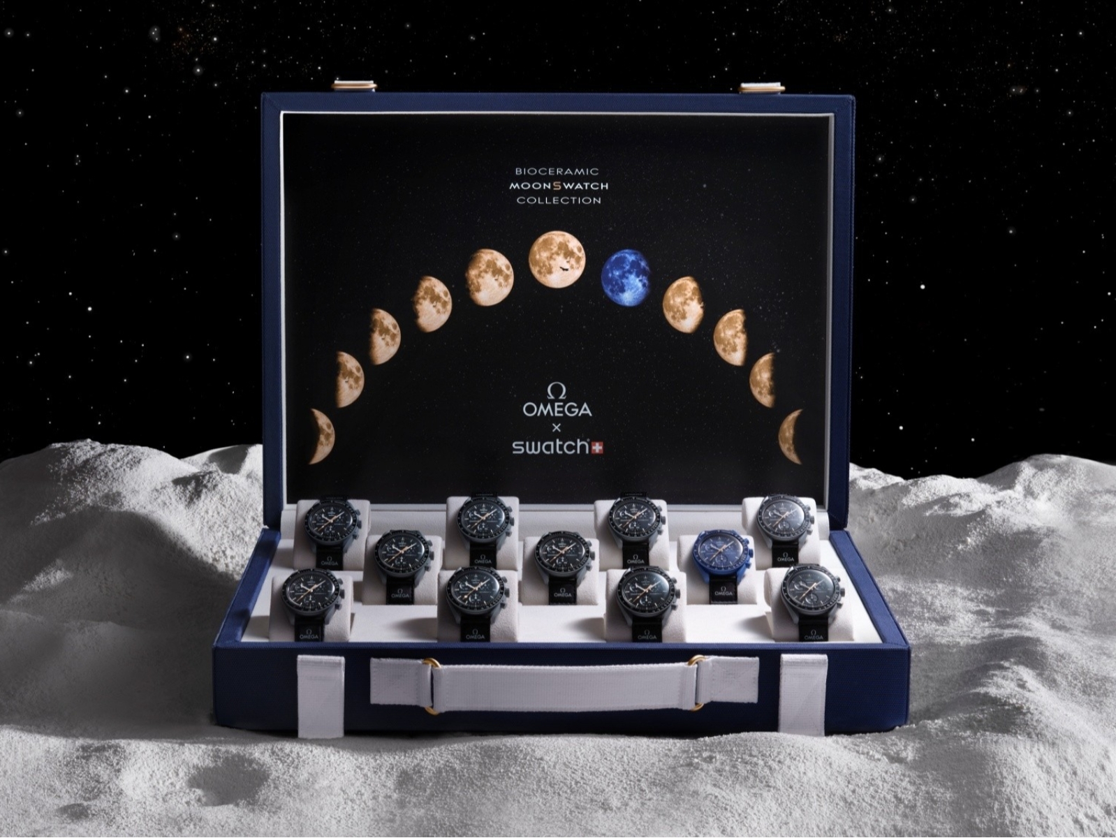 限量11 套MoonSwatch Moonshine Gold行李箱錶盒，歐米茄將為奧比斯（Orbis）於蘇富比（Sotheby’s）進行拍賣