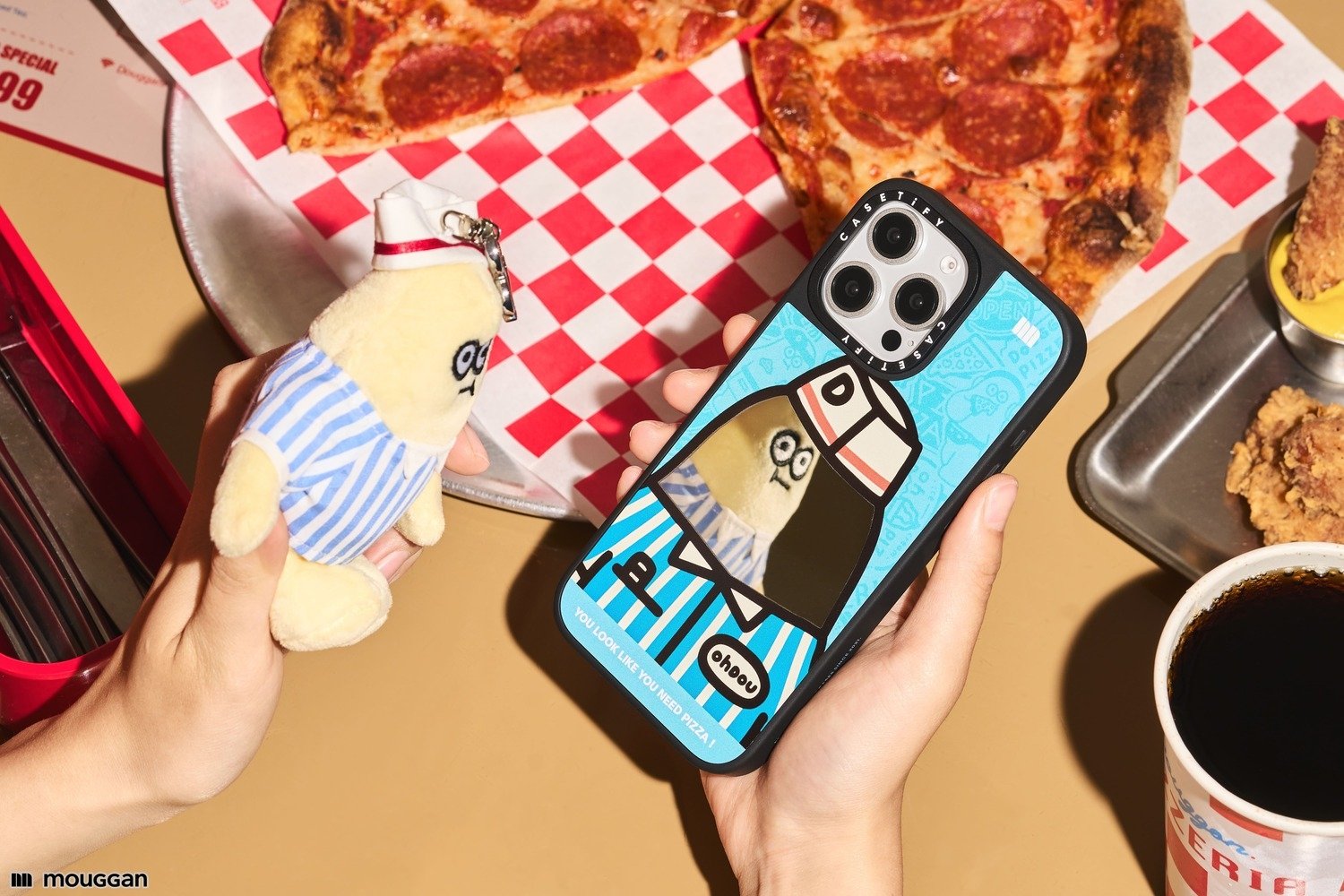CASETiFY 攜手大饅大力的服飾品牌 mouggan 推出聯名系列,與原創角色「歐兜 Ohdou」打工仔展開不可能的追夢冒險