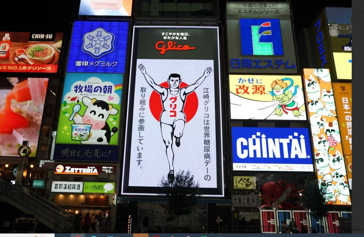 日本大阪心齋橋「固力果跑跑人」招牌日夜不一樣!網友翻舊照對比引熱議!