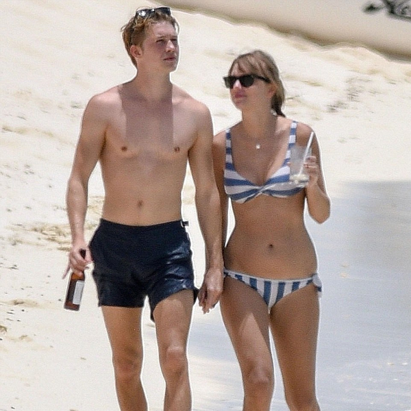 身高都超過 180 公分！泰勒絲牽男友喬艾文沙灘渡假　高挑明星情侶檔令人稱羨！